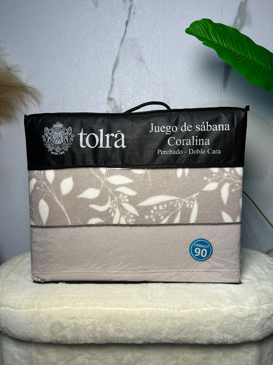 Sábanas de coralina Tolrà beige con hojas blancas para cama de 90 cm