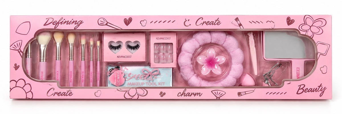 Set de maquillaje y accesorios de belleza Kevin&Coco en caja rosa con brochas, pestañas postizas y accesorios
